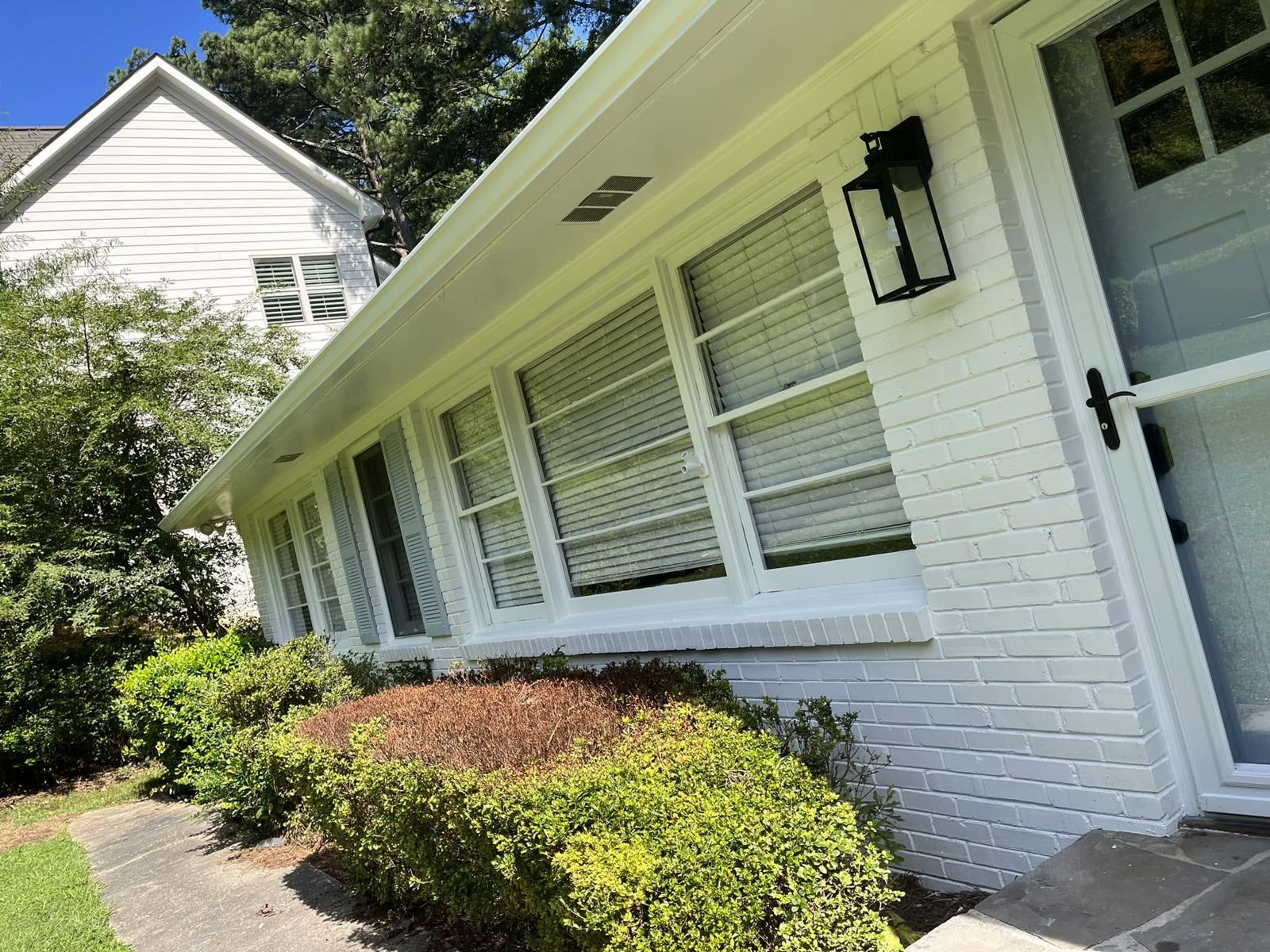 White painted brick ranch house