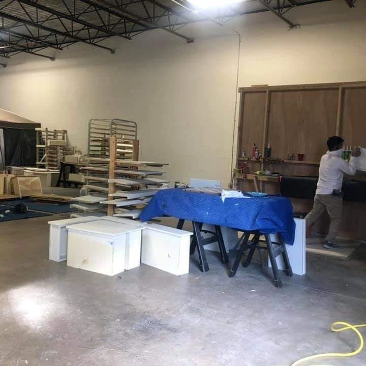 Cabinet doors being refinished in the Madera workshop